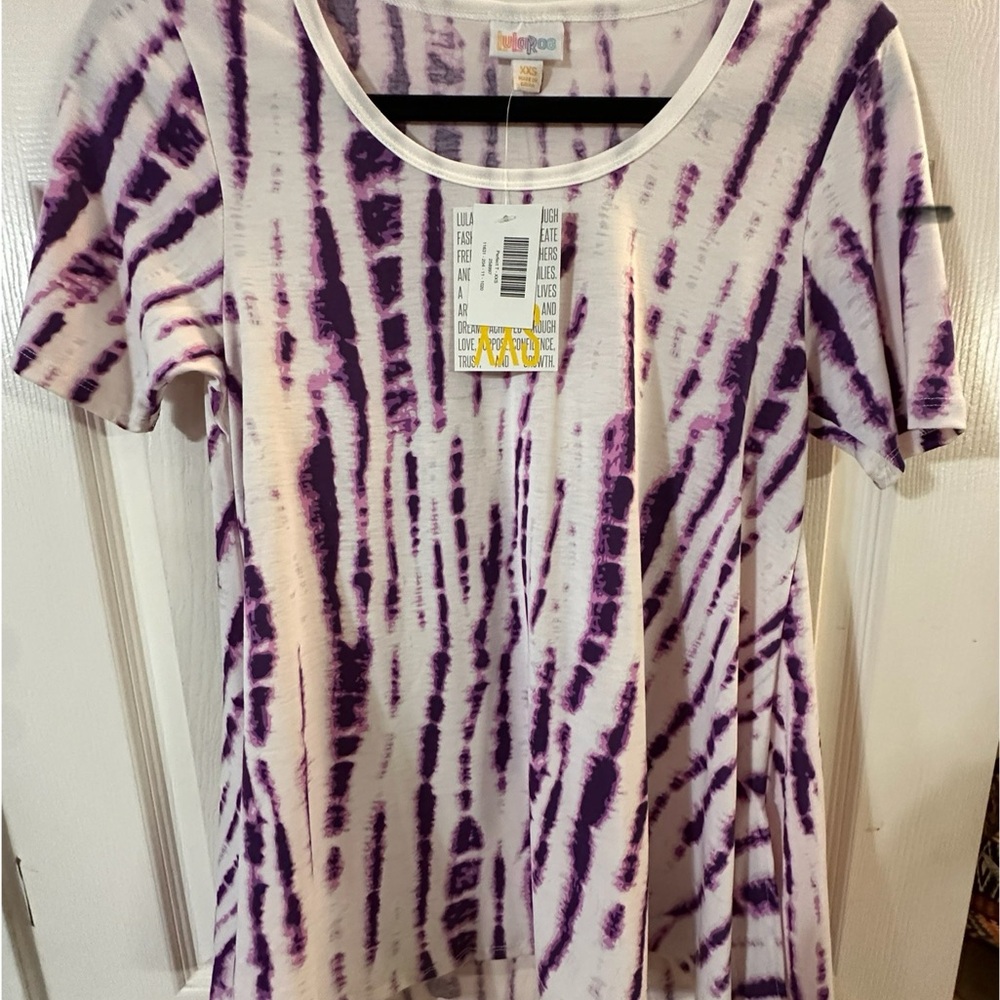 LEAVING SOON GRAB IT NOW! 
LuLaRoe Perfect Tunic Tee - XXS